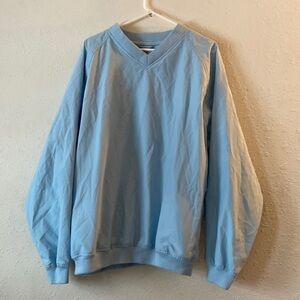 A men’s size extra-large, consensus, golf pull over T21